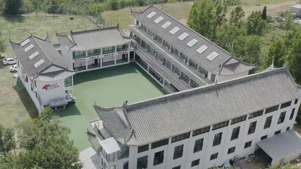 Aerial view of the Shaolin Zhong Wu campus and its training courtyard in the hills near the Shaolin Temple, Dengfeng China