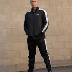 Model wearing Limited Edition Black Tracksuit